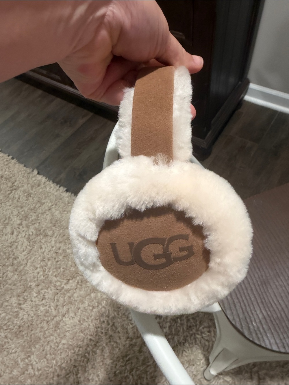 UGG ear muffs with plush cream shearling and chestnut suede accents